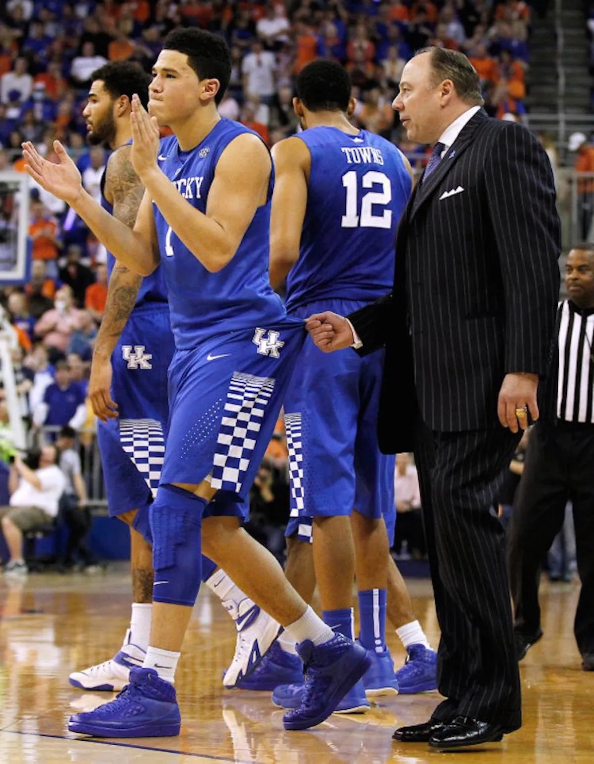 Devin Booker wearing the Don C x Air Jordan 2 Varsity Royal colorway to match the Kentucky Wildcats jersey