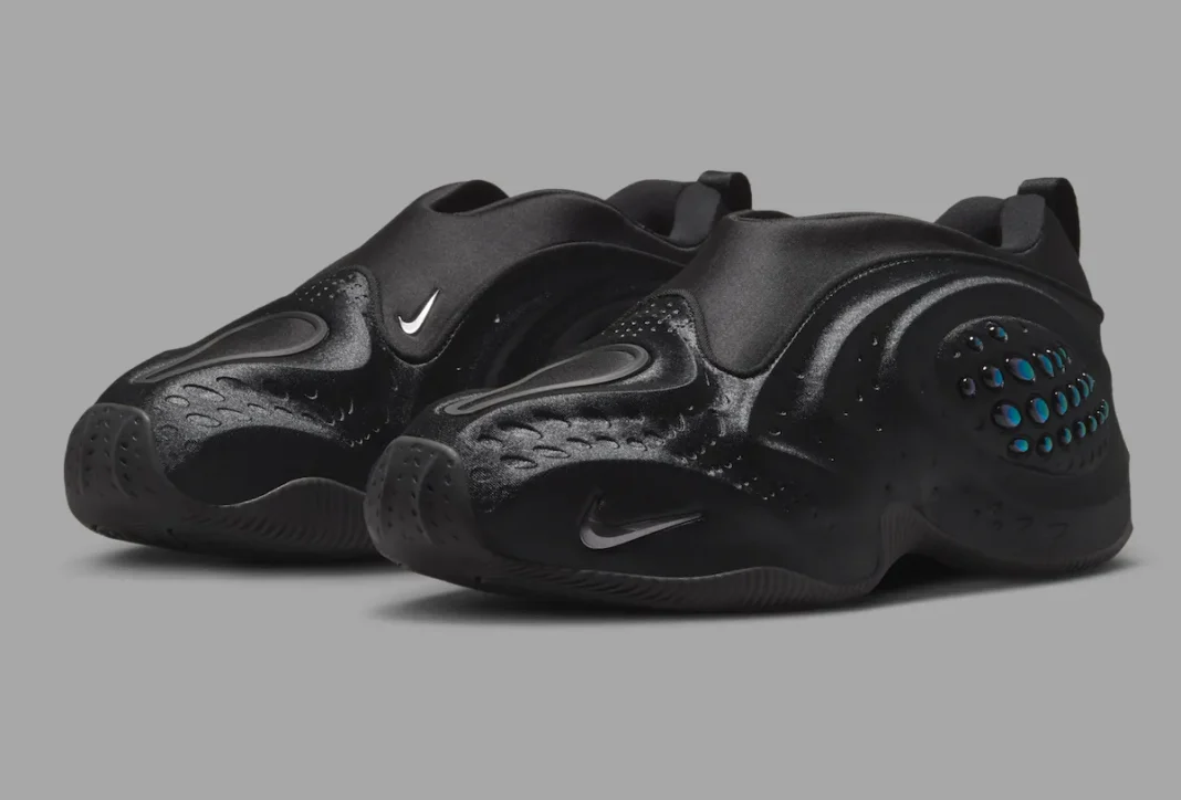 Nike First Sight Shadow in Black with Metallic Dark Grey accents, showing molded upper and sculptural texture details - detail view 1