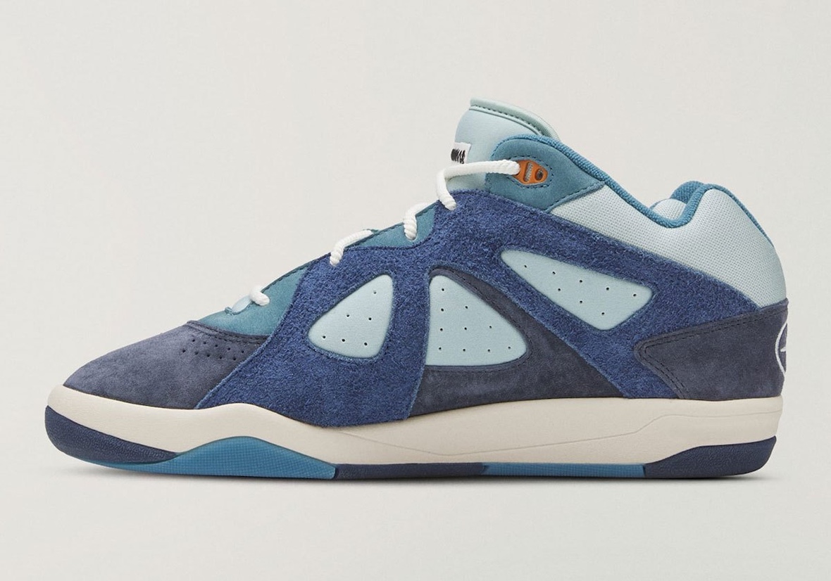 adidas Badbo 1.0 'Night Navy' by Bad Bunny in tonal blue suede with orange eyelets and vintage midsole - detail view 4