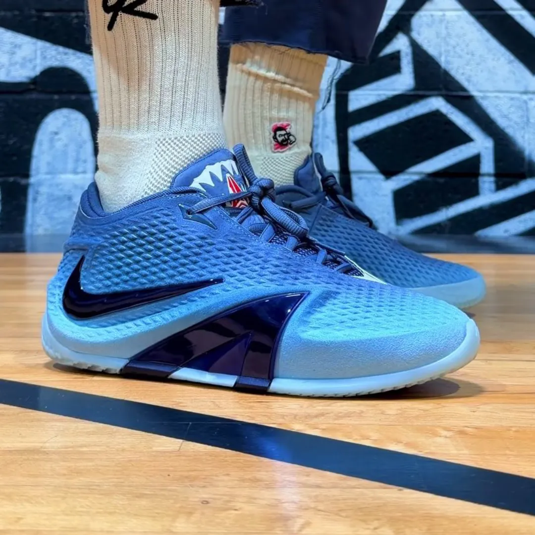 Nike Ja 4 Jaws Deep Water colorway featuring shark-tooth graphics and blue gradient upper, releasing September 18, 2026 - detail view 2