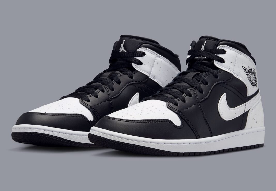 Air Jordan 1 Mid Oreo in black and white leather with speckled paint accents, releasing Fall 2026 - detail view 1