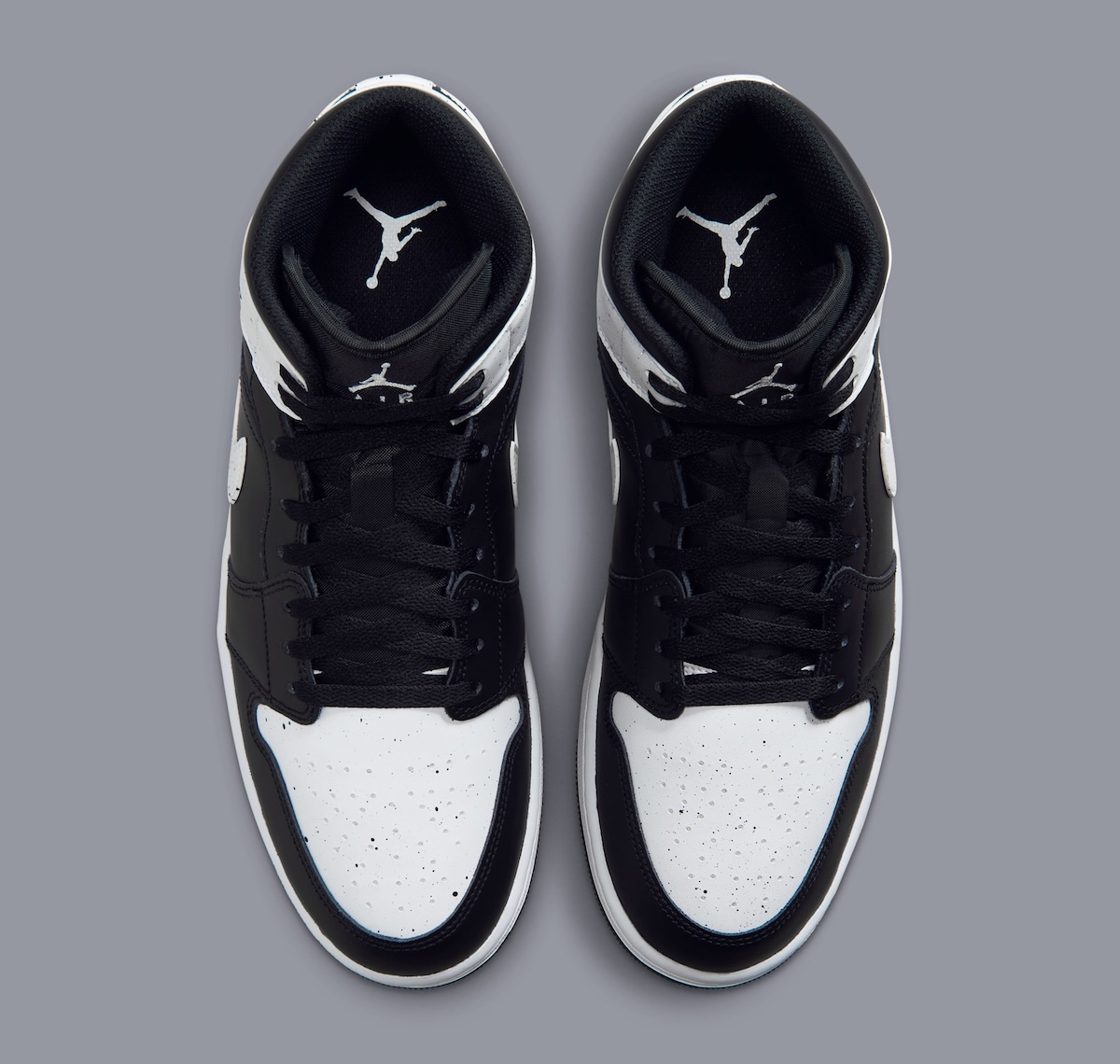 Air Jordan 1 Mid Oreo in black and white leather with speckled paint accents, releasing Fall 2026 - detail view 5