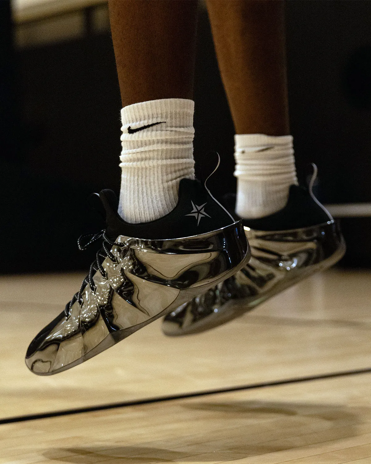 AJ Dybantsa wearing unreleased Nike GT low-cut basketball model with molded shell construction and custom PE heel logo during NBA Summer League Las Vegas workout - detail view 2