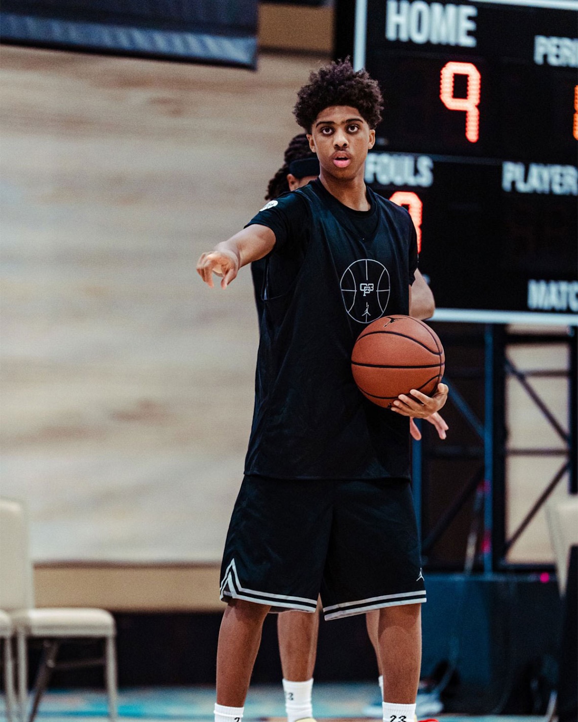 Jayson Tatum wearing the exclusive Jordan Tatum 4 PE in pink, purple, and yellow at the Tatum x CP3 Elite Camp in Las Vegas - detail view 4