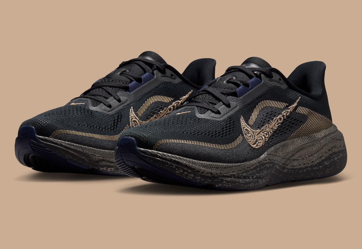 Nike Running Keely Hodgkinson four-shoe collection featuring Pegasus 42, Vomero Plus, ZoomX Vaporfly NEXT%, and Victory 2 in black and Midnight Blue with gold accents - detail view 2