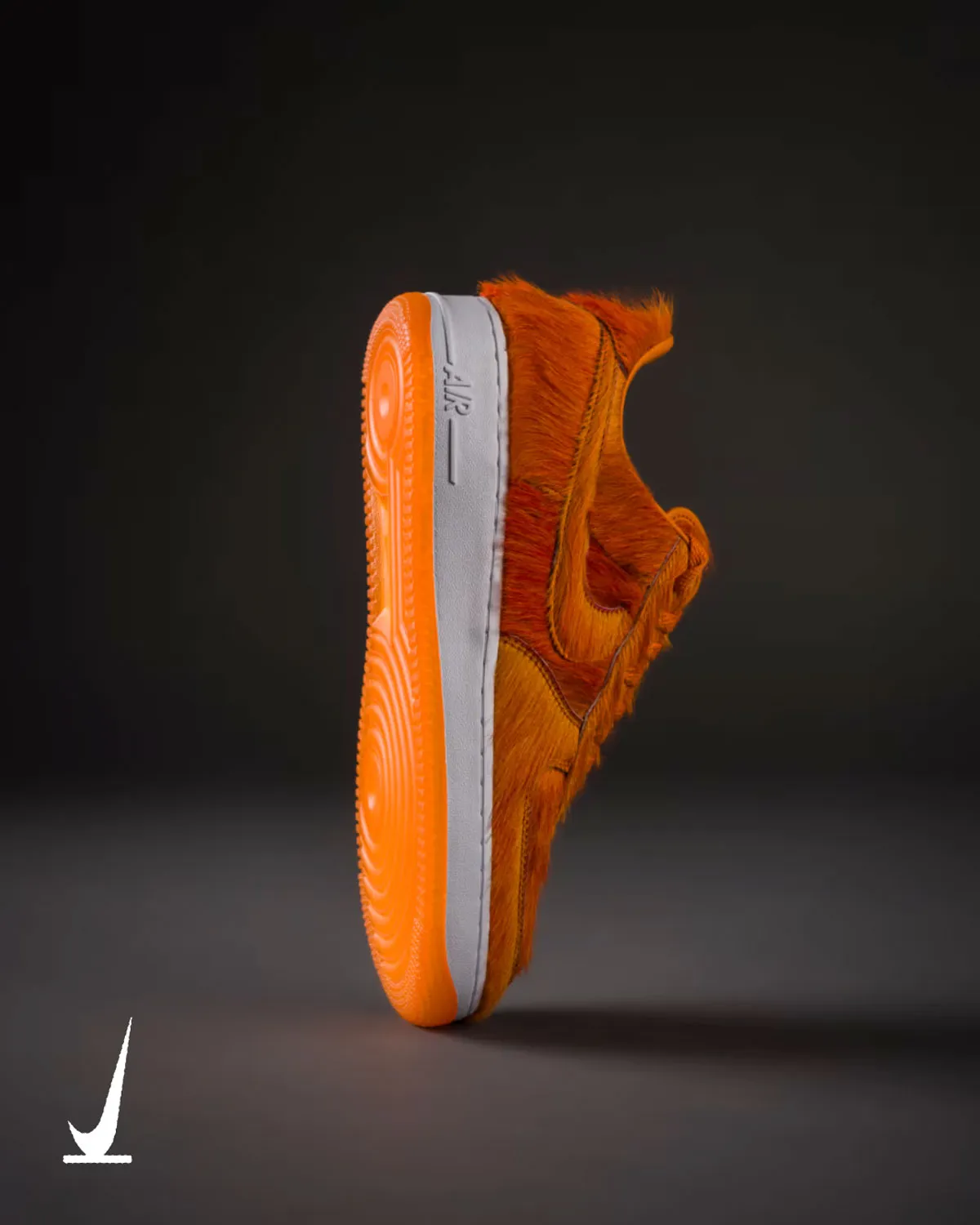 Nike Air Force 1 Low in Campfire Orange pony hair with white midsole, showing full faux fur coverage across upper - detail view 3