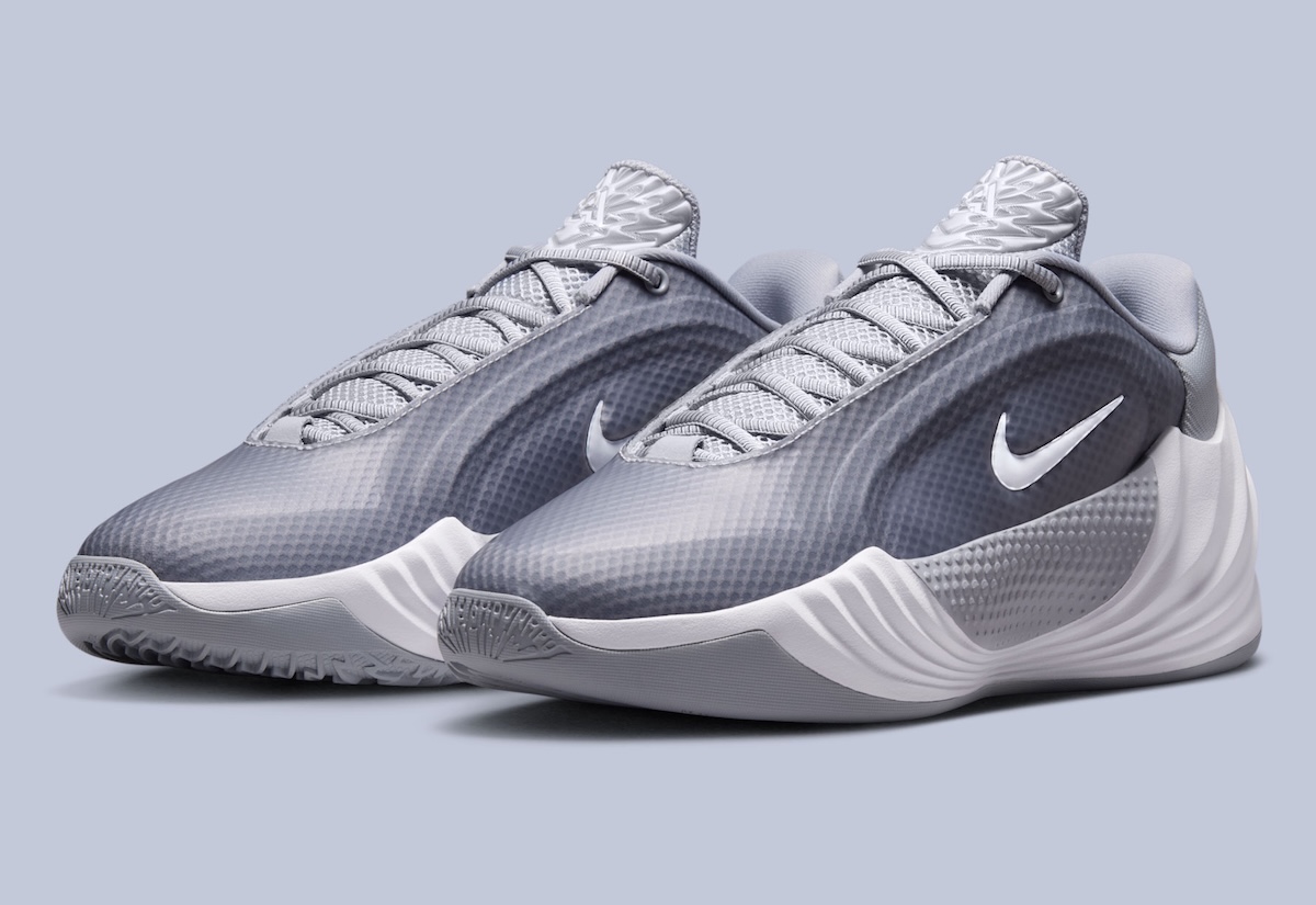 Nike Giannis Freak 8 Team Bank in Wolf Grey/Volt-White and Black/Volt-White colorways, showing side profile and traction pattern detail - detail view 2