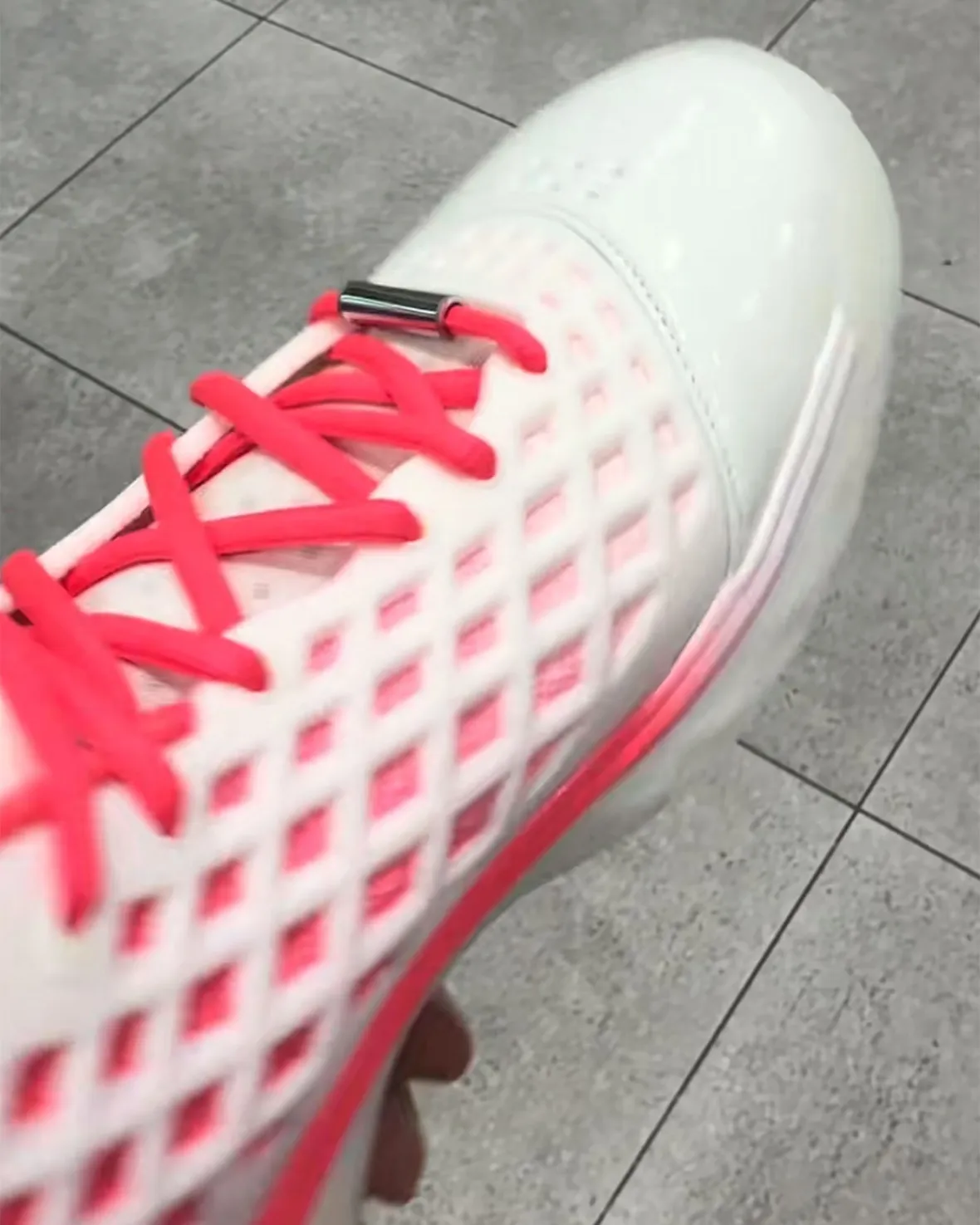 Nike Kobe 3 Low Protro in Sail and Hot Punch colorway with chrome heel counter and diamond-shaped pink cutouts, WNBA All-Star edition - detail view 3