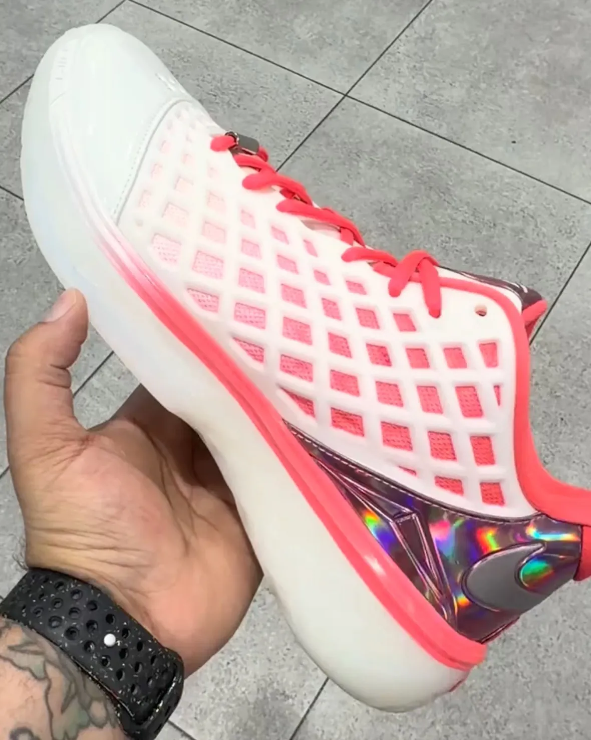 Nike Kobe 3 Low Protro in Sail and Hot Punch colorway with chrome heel counter and diamond-shaped pink cutouts, WNBA All-Star edition - detail view 2