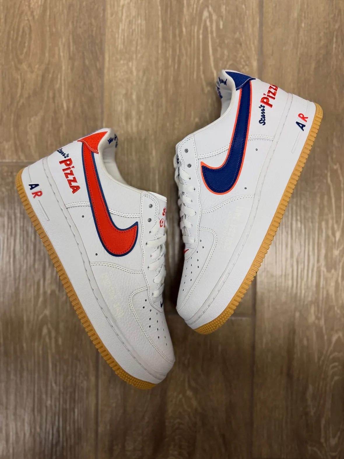Scarr's Pizza x Nike Air Force 1 Low sample in white pebbled leather with mismatched double-layer Swooshes and updated tongue graphic - detail view 2