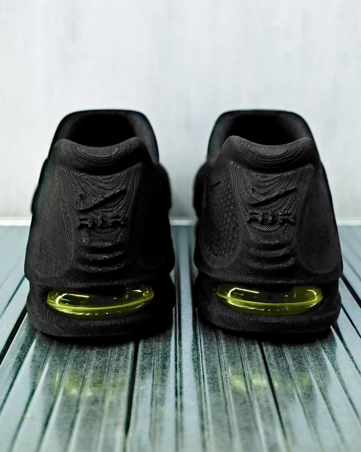 Nike AirWorks 3D-printed Air Max concept by Motoi Hatsuki, showing monolithic upper and midsole construction with visible Air unit - detail view 3