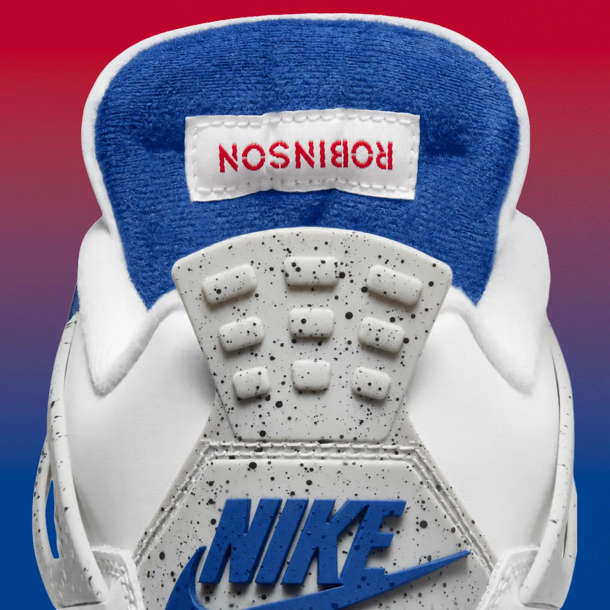 Air Jordan 4 Jackie Robinson in Sail with Dodgers blue and red accents, featuring Robinson's No. 42 on the heel and heritage detailing - detail view 5