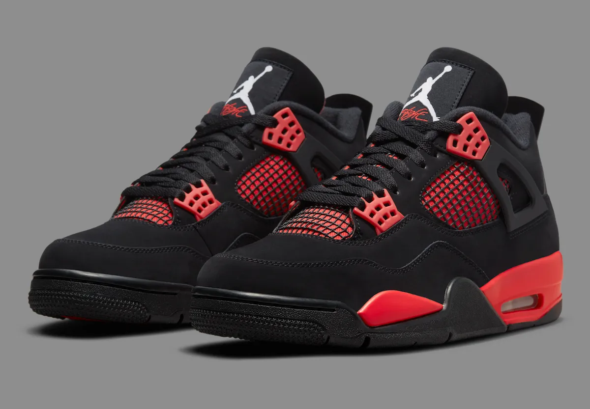 Air Jordan 4 'Red Thunder' with black nubuck upper and crimson accents on side mesh and midsole - detail view 2