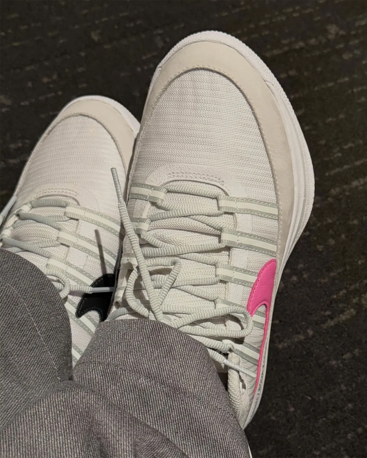 Fragment Design x Nike Book 2 in white with light tan accents and pink Swoosh, midsole detail showing black "The Classic: BOOK 2: Fragment" text - detail view 3