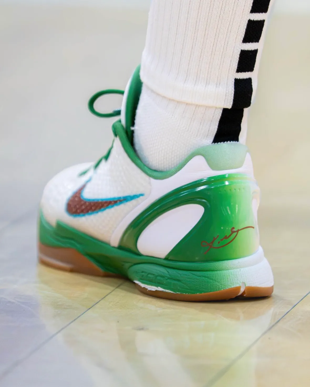 Aaliyah Chavez wearing exclusive Nike Kobe 6 Protro Mexico PE with red, white, and green gradient colorway during preseason warm-ups - detail view 3