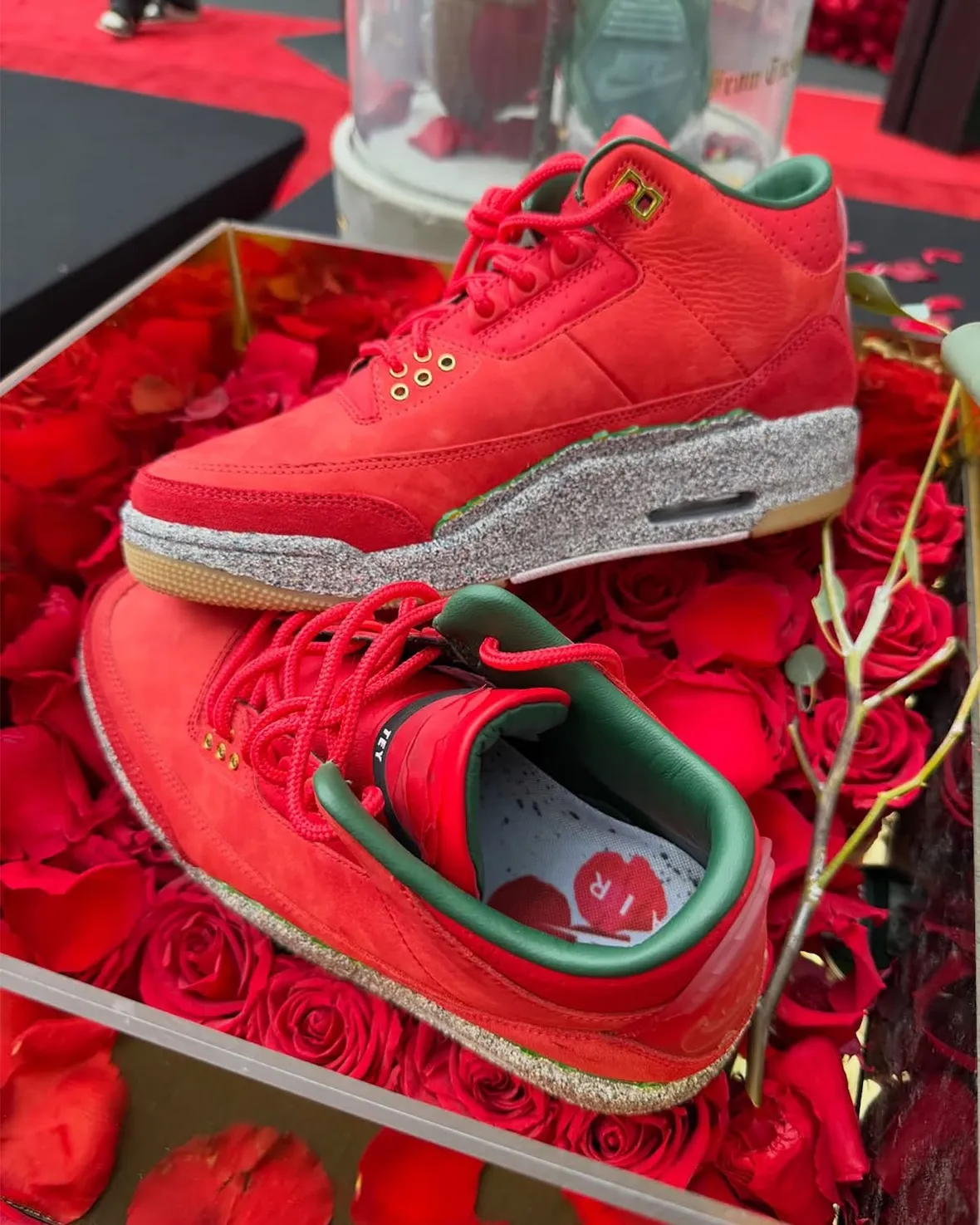 Unreleased Teyana Taylor x Air Jordan 3 sample in red and grey displayed at Dyckman Basketball League - detail view 3